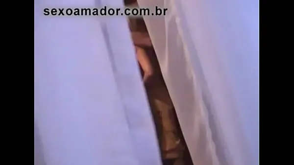 Horny neighbor records amateur video of couple having sex in apartment opposite
