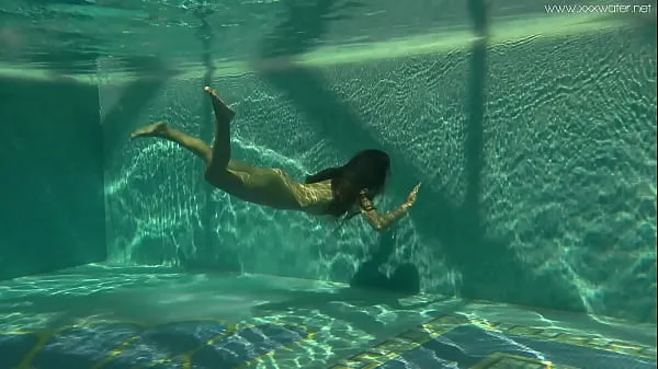 XXX Hottest Russian pornstar Irina strips nude in swimming pool mega Movies